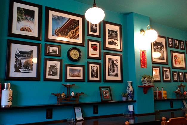 composition and alignment of prints for harmonious gallery wall