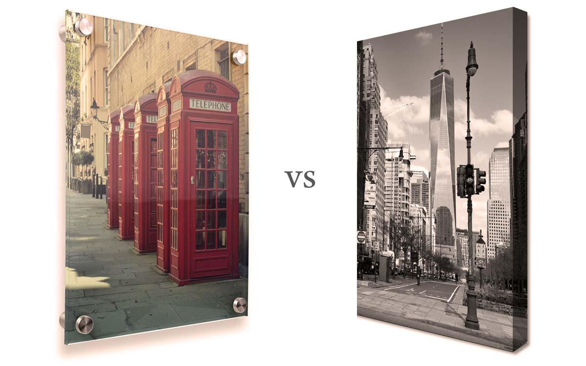 Acrylic photo print with standoff mounts next to a stretched canvas print comparing the two print types