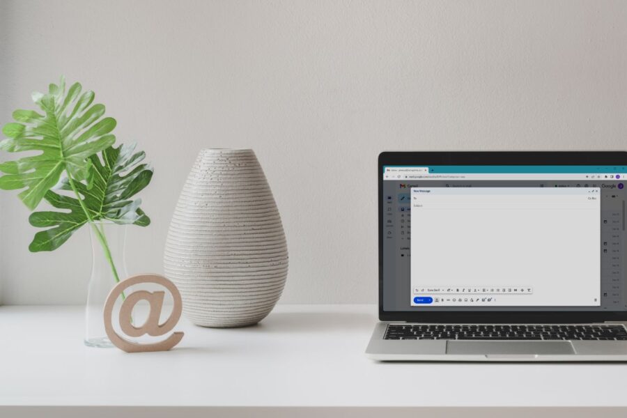 Laptop showing a blank email compose window with the subject field, used to write email subject lines