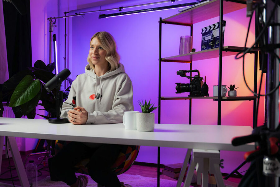 Content creator recording in a home studio setup used for influencer marketing partnerships